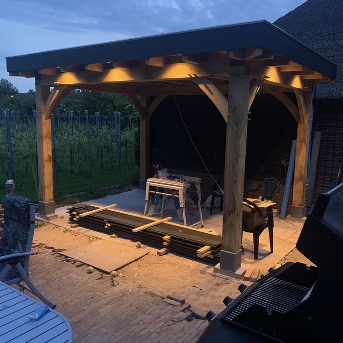 Luxury oak veranda featuring a sustainable Ipe hardwood decking floor for a premium outdoor finish